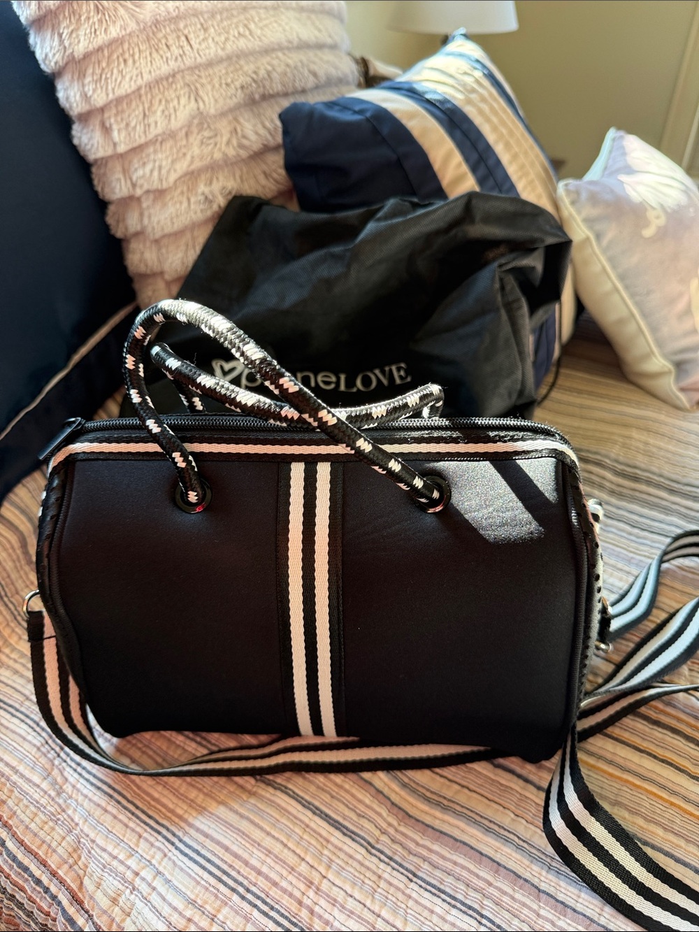 Black Crossbody Barrel Bag with Cream-Striped Accent